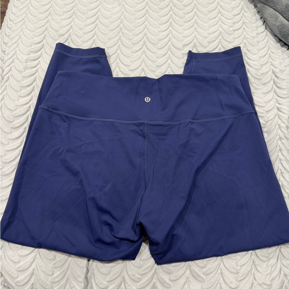 Lululemonn size 18 navy blue winder train leggings with drawstring